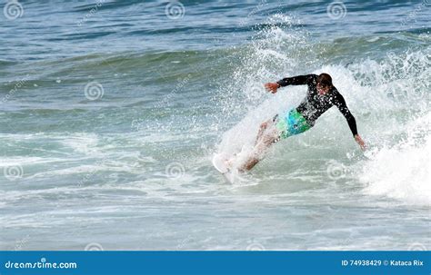 Amateur Surfer Surfing On The Beach Editorial Stock Image Image Of