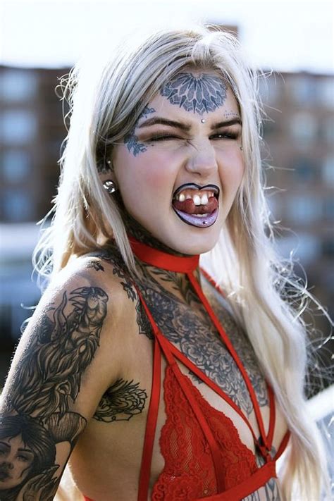 body mod insanelabz piercings tattoos tattedgirls ink tonguesplit face tattoos girl