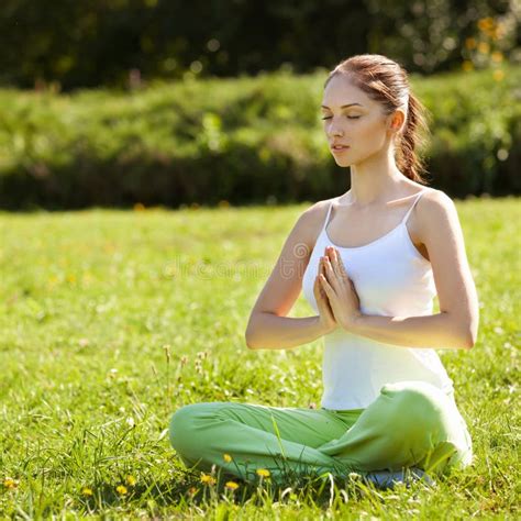 Young And Beautiful Woman Doing Yoga Exercises Yoga Background Stock