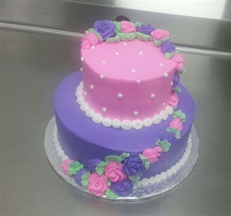 2 Tier White Cake With Whipped Icing In A Pink And Purple Theme With