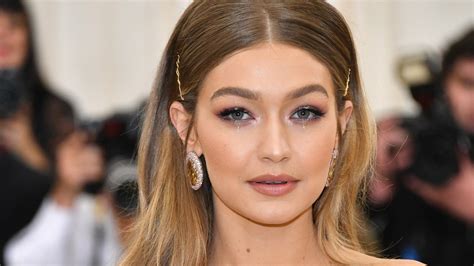 Gigi Hadid Matched Reebok Sneakers To Her Swimsuit Teen Vogue