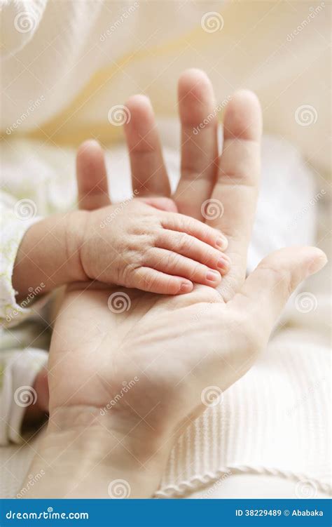 Mothers Hand Holds Palm Of The Baby Stock Image Image Of Caucasian