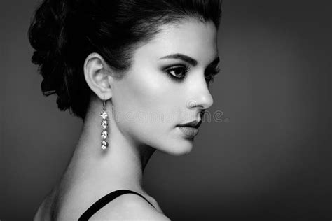 Fashion Portrait Of Young Beautiful Woman With Jewelry Stock Photo