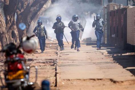 Police Fire Tear Gas Beat Anti Mugabe Marchers Monitor