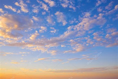 Sunset Sky With Golden And Blue Clouds Stock Photo By ©lunamarina 100343832