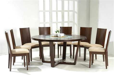 This is the right website for you if you are looking for round kitchen table sets to furnish your new house or replace the old one. Dark Walnut Modern Round Dining Table w/Glass Inlay