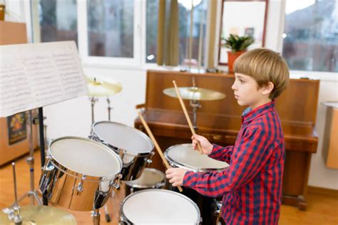 Happy Little Boy Playing Drums Stock Photos Pictures And Royalty Free