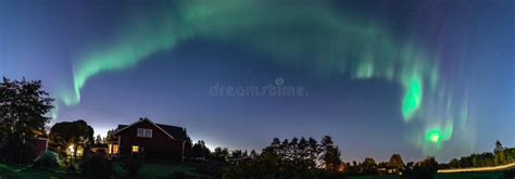 Panorama Of Dancing Northern Lights Aurora Borealis In Autumn Over