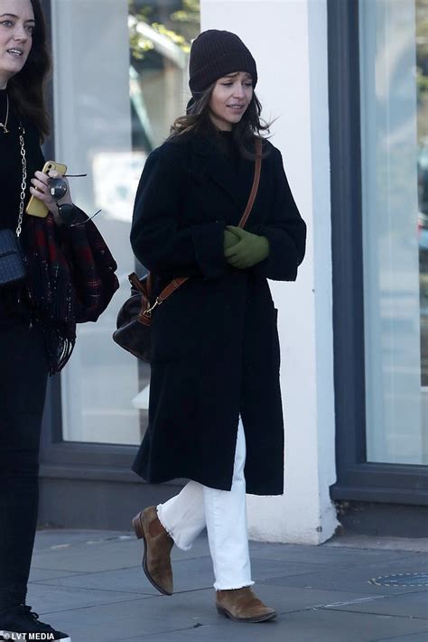 Emilia Clarke Cuts A Casual Figure In Long Black Coat In London Readsector