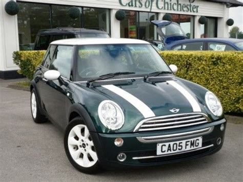 The New Mini Cooper S In British Racing Green With White Roof And