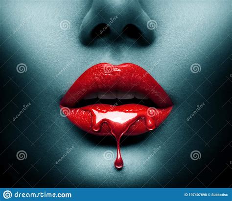Red Paint Dripping Lipgloss Drops On Lips Bright Liquid Paint On Beautiful Model Girl S Mouth
