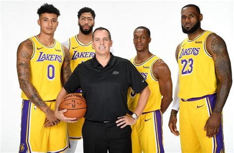 The Los Lakers Basketball Team Is Posing For A Photo