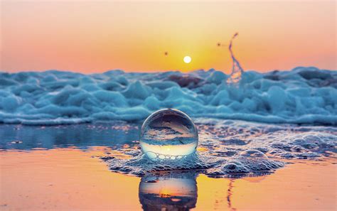 Ocean Beach Magical Glass Ball Reflecting On Ocean Beach Seashore