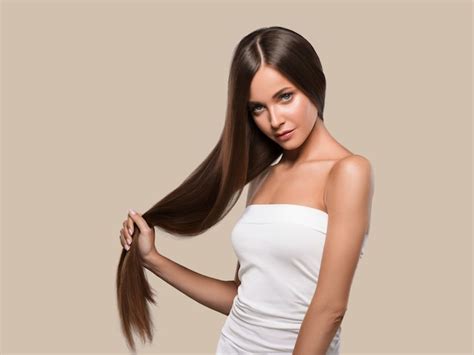 Premium Photo Beautiful Smooth Hair Long Brunette Hairstyle Woman