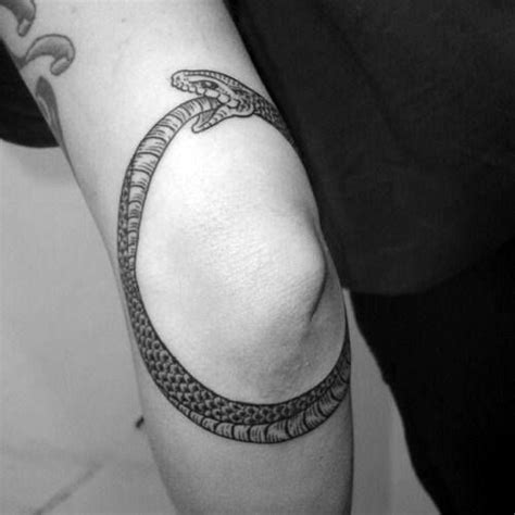 Https://tommynaija.com/tattoo/dragon Tail Down The Elbow Tattoo Design