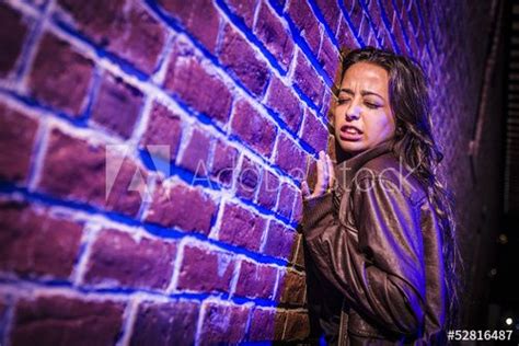 Frightened Pretty Babe Woman Against Brick Wall At Night Brick Wall Pretty Frightening