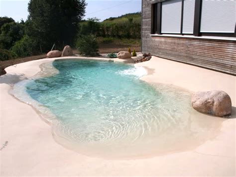 These Stunning Sand Pools Bring The Beach To Your Backyard In