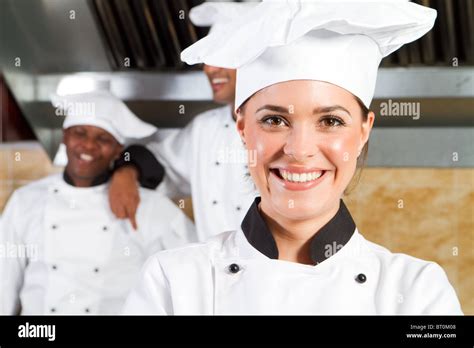 Happy Chef In Restaurant Kitchen Stock Photo Alamy