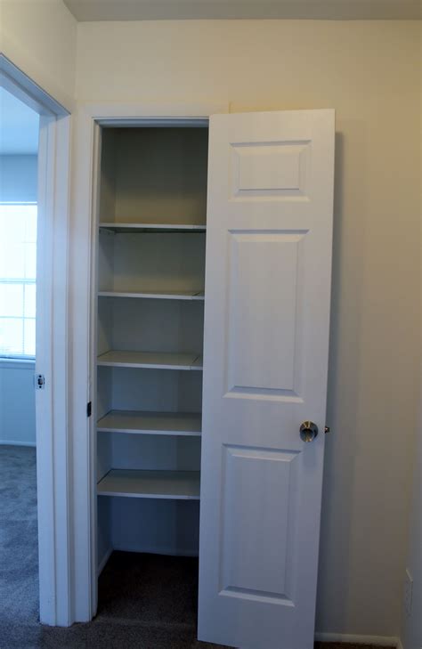The Obvious Linen Closet With Sturdy Shelves And White Paneled Doors