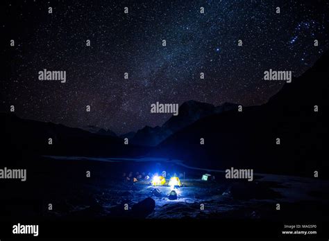 A Stunning View Of Stars And Milky Way Galaxy Above A Campsite Near