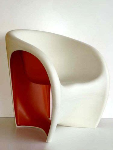 Devona charcoal and white polyester/linen arm chair. This vintage armchair in white and orange polyethylene has ...