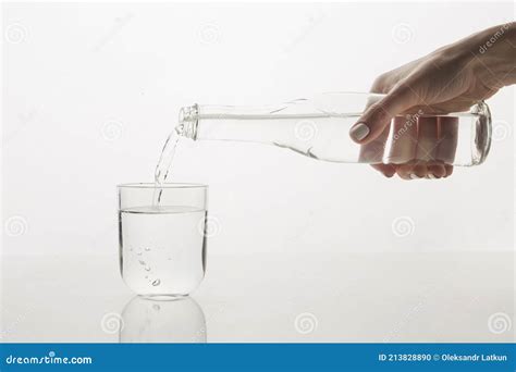 Person Pouring Water Glass Front View High Quality And Resolution