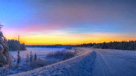 Sunset Over Winter Road Hd Wallpaper Background Image 1920x1080