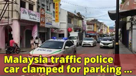 You will immediately be given a temporary transaction number. Malaysia traffic police car clamped for parking illegally ...