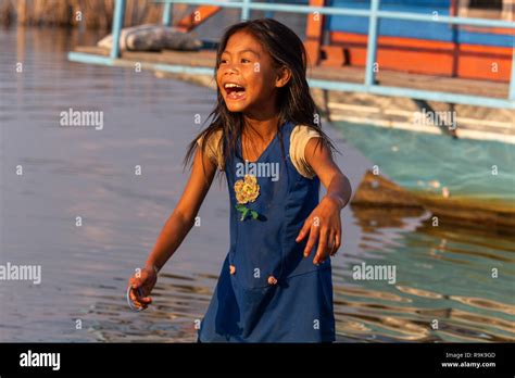 Thakhek Laos April Happy Girl Playing Near The Water In A Remote Rural Area Of Laos