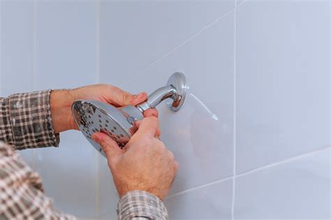 Replacing The Plumbing In The Bathroom Mounted Hand Shower Holder With