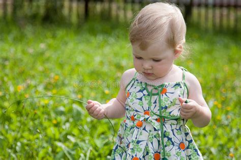 Pretty Baby Girl Walking In A Park Stock Photo Image Of Little