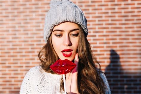 Free Photo Portrait Beautiful Brunette Girl With Lollipop Lips On