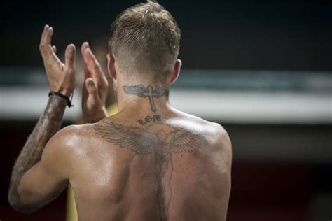 David Beckhams Cross Neck Tattoo Romeo Beckhams New Tattoos