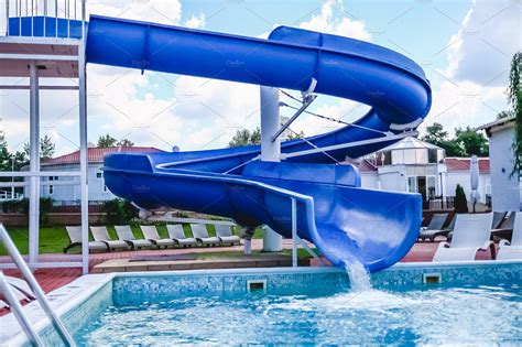 Water Fun In The Pool Slide Concep Containing Pool Slide And Water Arts And Entertainment