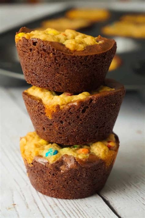 Chocolate and vanilla ice creams, fudge topping, crushed chocolate sandwich cookies and whipped topping are layered for a luscious dessert in our black magic parfait cups recipe. Monster Cookie Brownie Cups are an easy dessert recipe ...