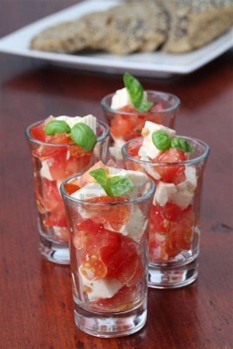 Shot glass desserts are the perfect little sweet treat after dinner and these recipes are sure to be the highlight of any party you throw. appetizer shot -- tomato mozz basil | Shot glass ...