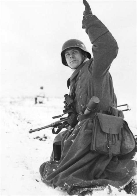 German Soldier Gives A Signal To His Men Eastern Front Winter 1944