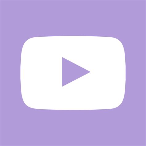 A White Play Button On A Purple Background