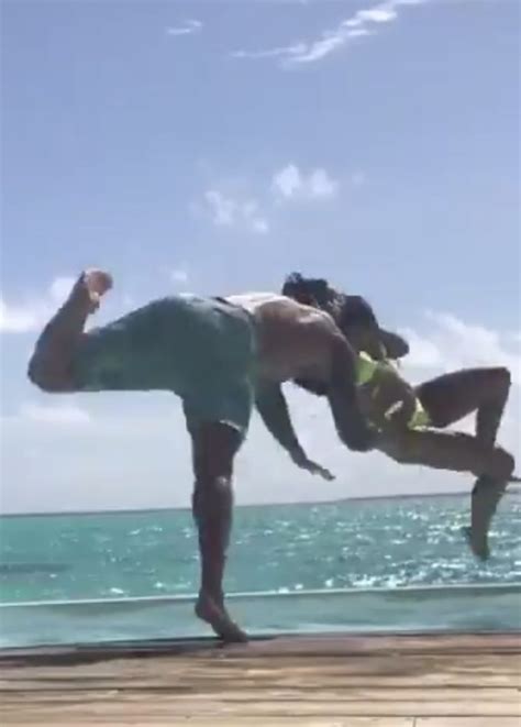 Wwes Randy Orton Gets Caught With An Rko Outta Nowhere By His Wife During Vacation In The
