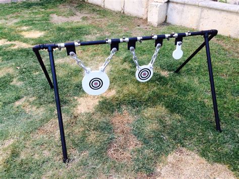 You can buy heavier rubber hanging straps too. DIY steel target holder, welded swivel hinges. | Shooting ...