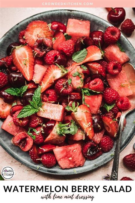 A Bowl Filled With Strawberries And Watermelon