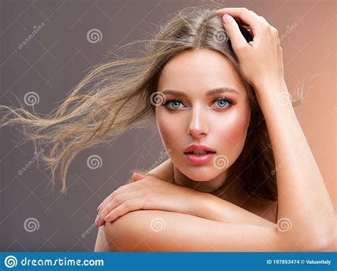 Portrait Of A Beautiful Woman With A Long Blond Hair Model With Beautiful Hairstyle Isolated