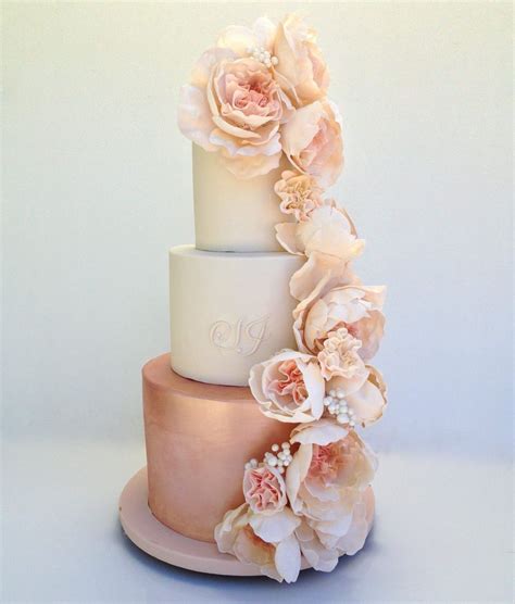 glamorous couples will fall in love with this elaborate rose gold wedding cake expertly created