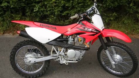 The model received many reviews of people of the automotive industry for their consumer qualities. honda crf100f - YouTube