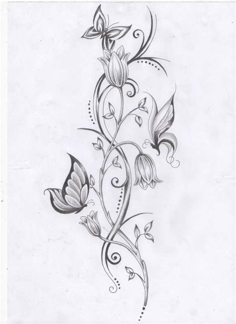 A Tattoo Design With Flowers And Butterflies On It