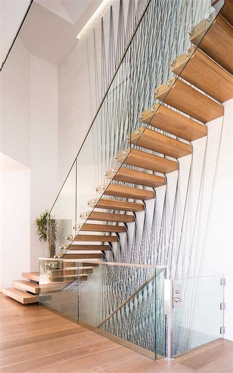 Latest tips and trends 2021 to design your own interior stairs design and which materials can choose to make contemporary interior staircase design ideas for. port-street-mid-century-modern-stairs-interior-backside - Patterson Custom Homes