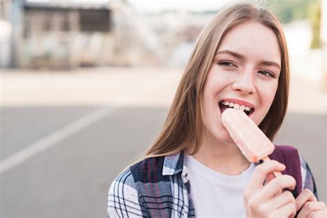 Attractive Woman Eating Popsicle Icecream Free Photo