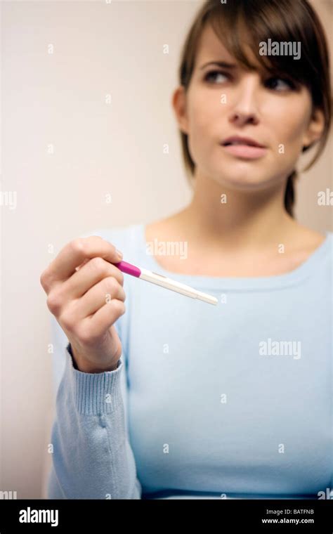 Young Woman Holding Her Pregnancy Test Stock Photo Alamy