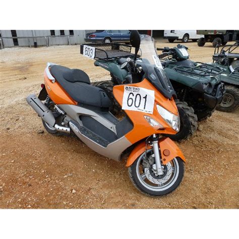 It was parked because of an overheating problem and neglect. KYMCO XCITING 250 MOTOR SCOOTER