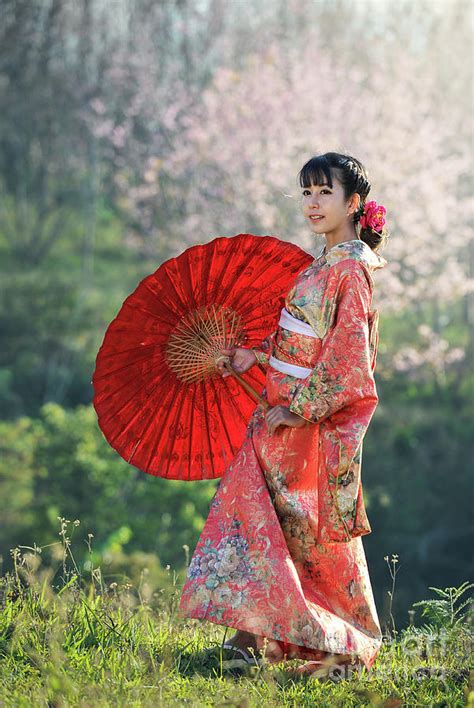 attractive asian woman wearing traditional japanese kimono photograph by sasin tipchai